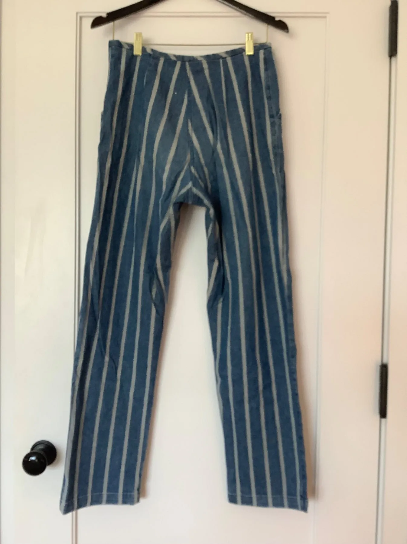 Blue wide striped denim, pleated.