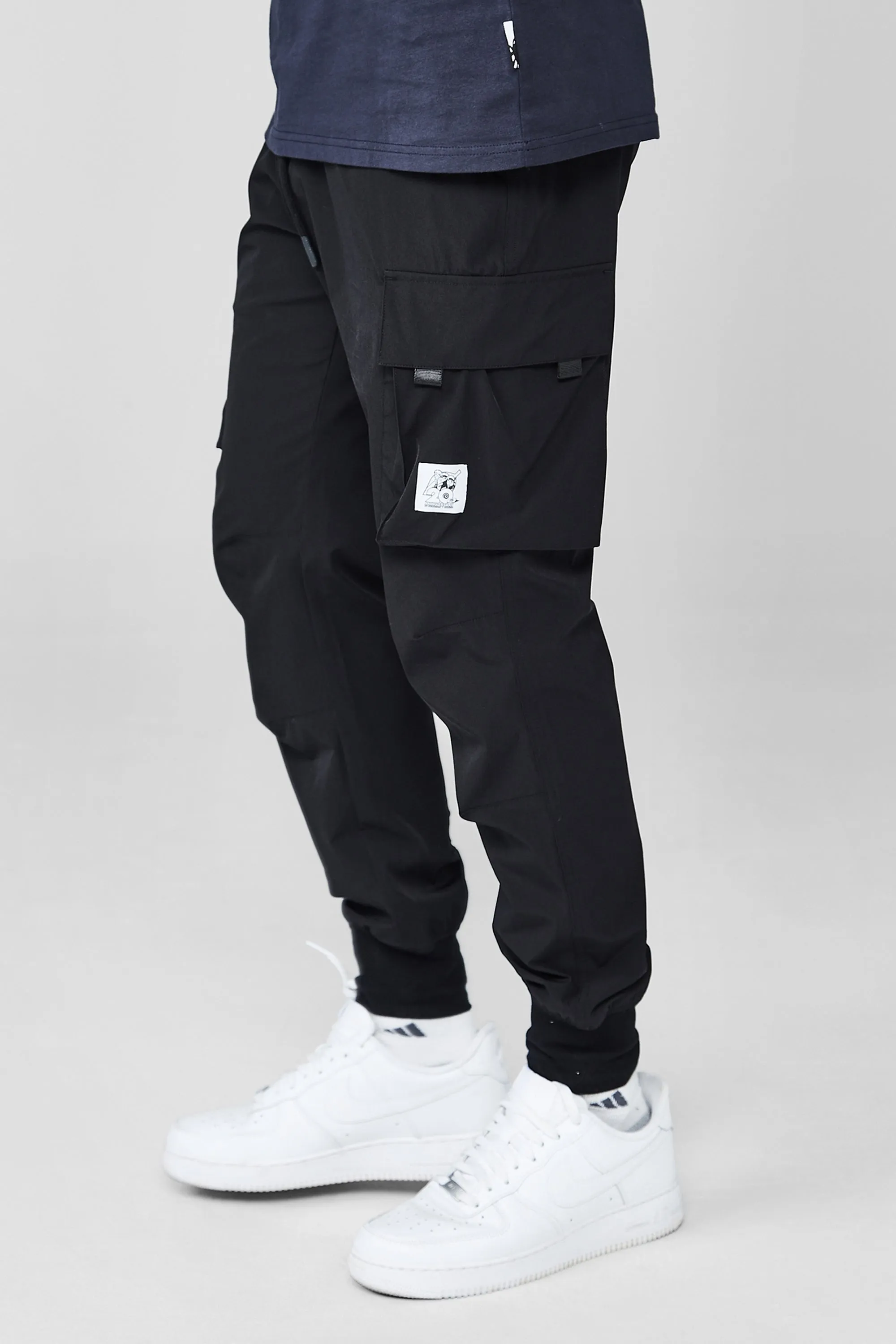 LIQUID X NARUTO 20Y LEAF VILLAGE CARGO JOGGER