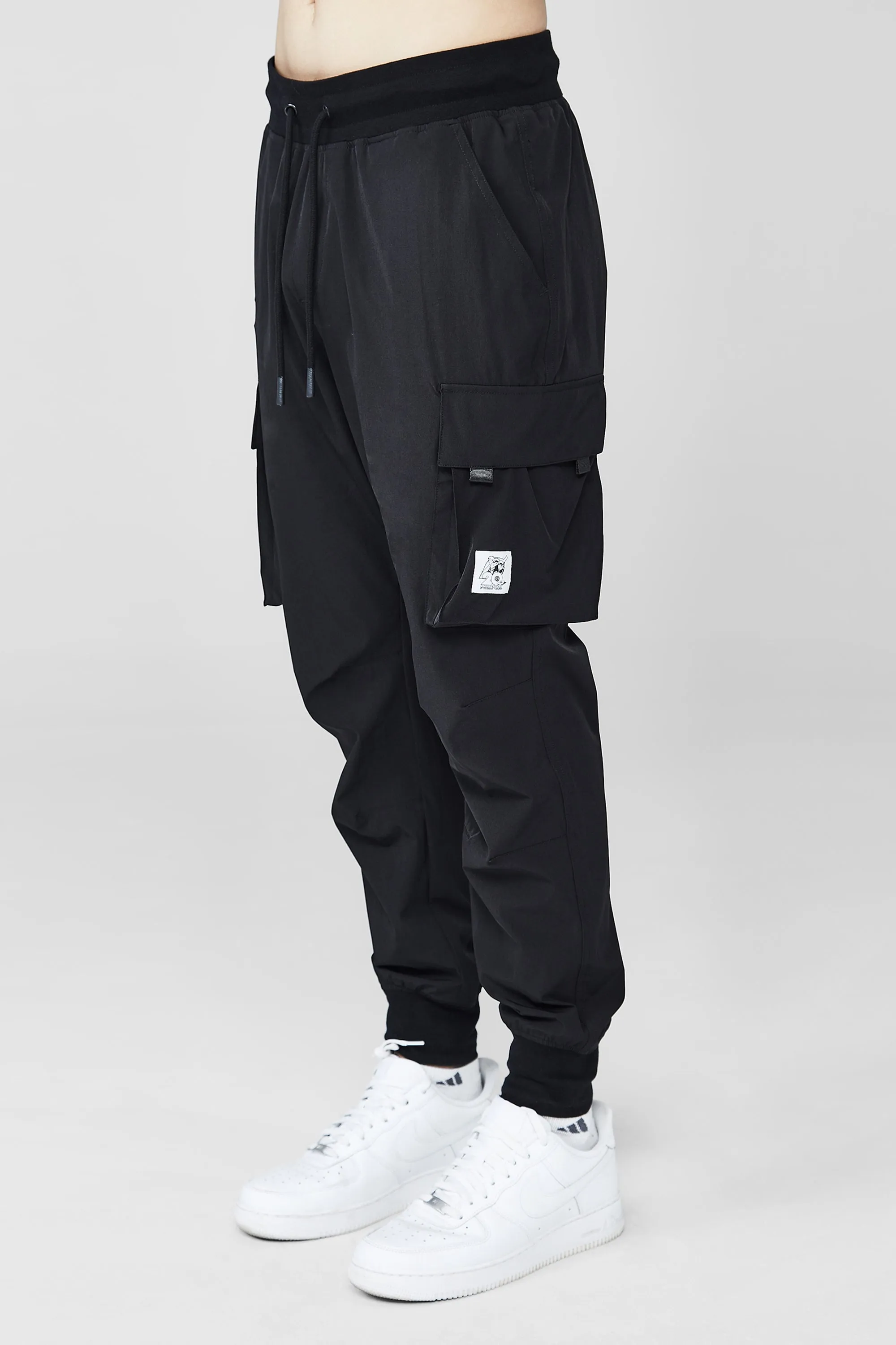 LIQUID X NARUTO 20Y LEAF VILLAGE CARGO JOGGER